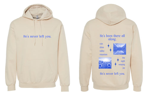 Gildan® He’s Never Left You Christian Hoodie | Faith-Inspired Unisex Sand Hoodie