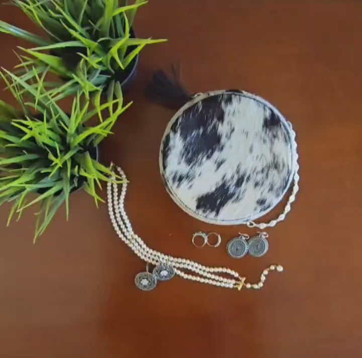 Load video: Cowhide Leather Jewelry Box